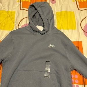 Nike sweater very nice colour, would keep but too small never worn with tags